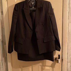 Black size 14 women skirt suit , nice material and lace up on  sides of jacket
